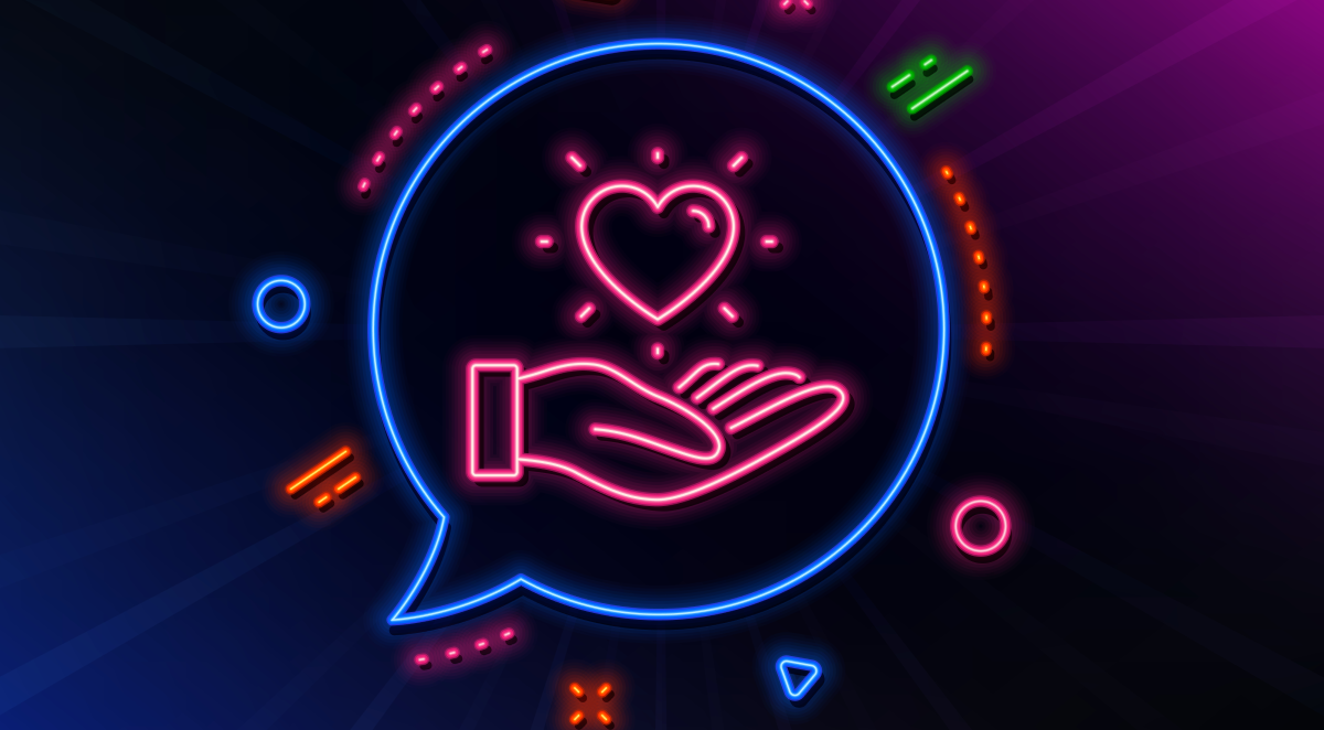 Mano de neón con corazón simboliza marketing emocional