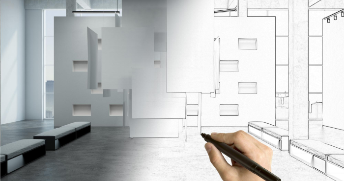 Mano con pluma trazando diseño arquitectónico