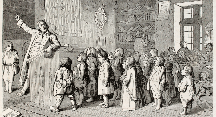 Pedagogo imparte clases en aula en siglo XVIII