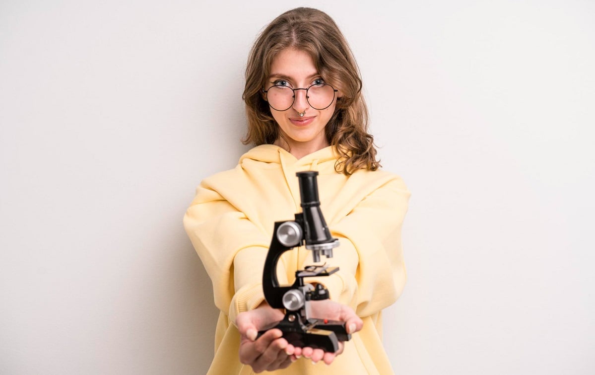 teenager-girl-scientist-student-with-microscope
